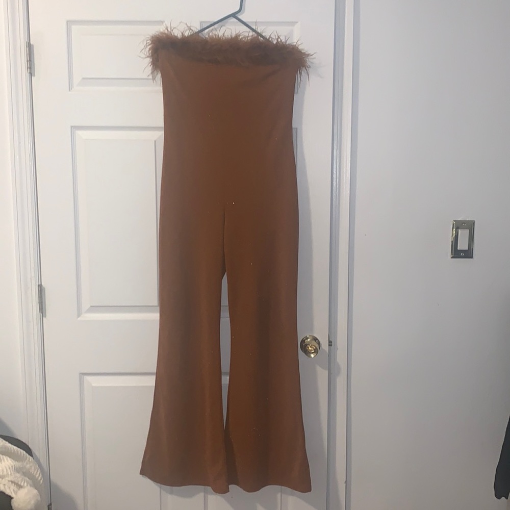 Fashion Nova Camel Glitter Jumpsuit size Large

Open to Offers!